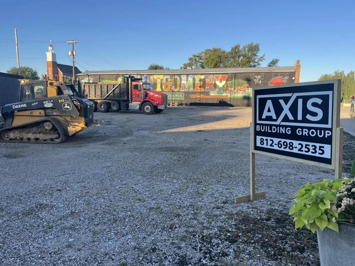 An Axis Building Group job site sign on a residential project